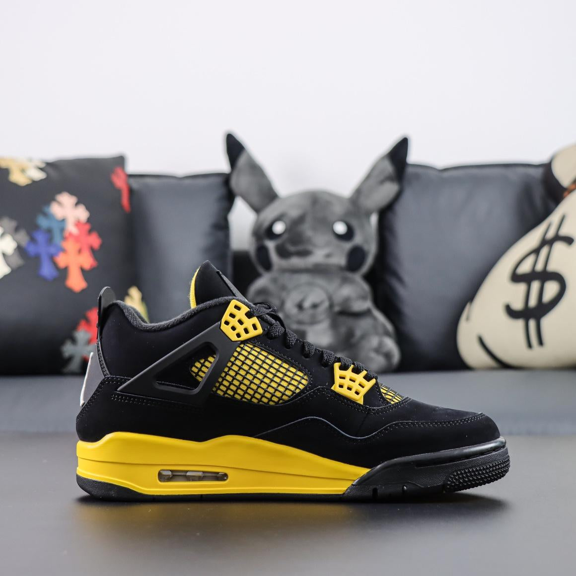 Air Jordan 4 Retro "Yellow Thunder"