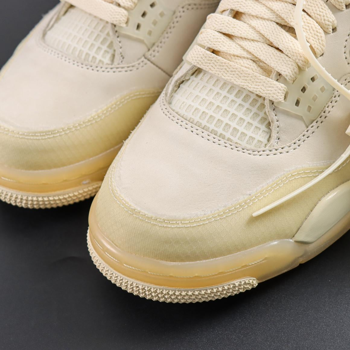 Air Jordan 4 Retro x Off-White "Sail"